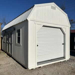 12x24 lofted barn garage wood storage shed with roll-up door and electrical package in Bowie TX