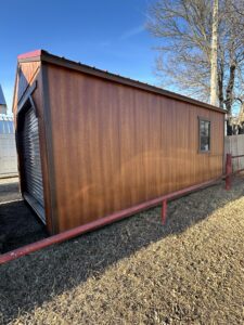 12x20 A-Frame garage wood storage shed with roll-up door and raised walls in Bowie TX